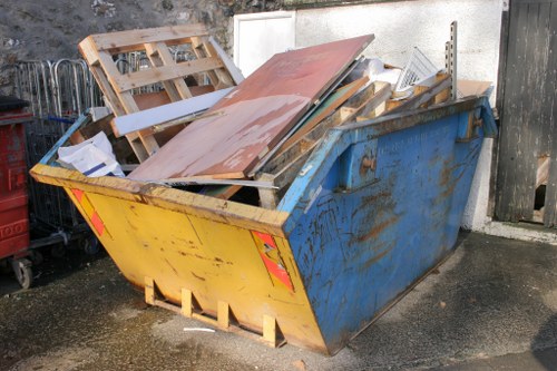 Construction site with a skip bin in the foreground